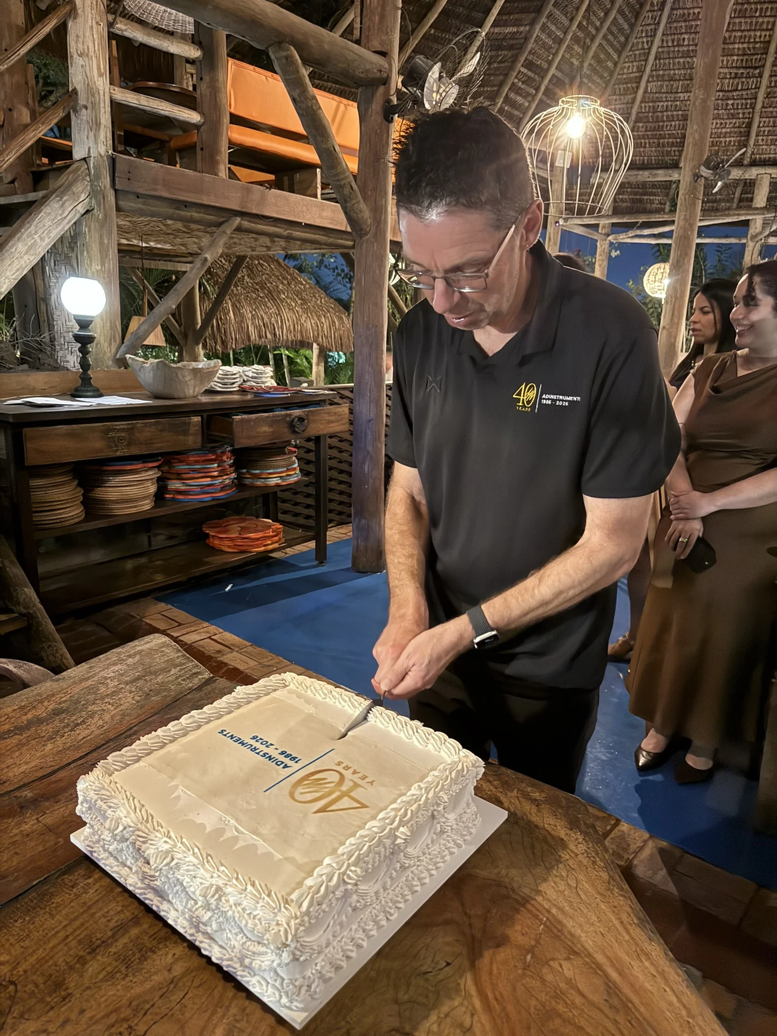 Brazil team cutting the 40th anniversary cake