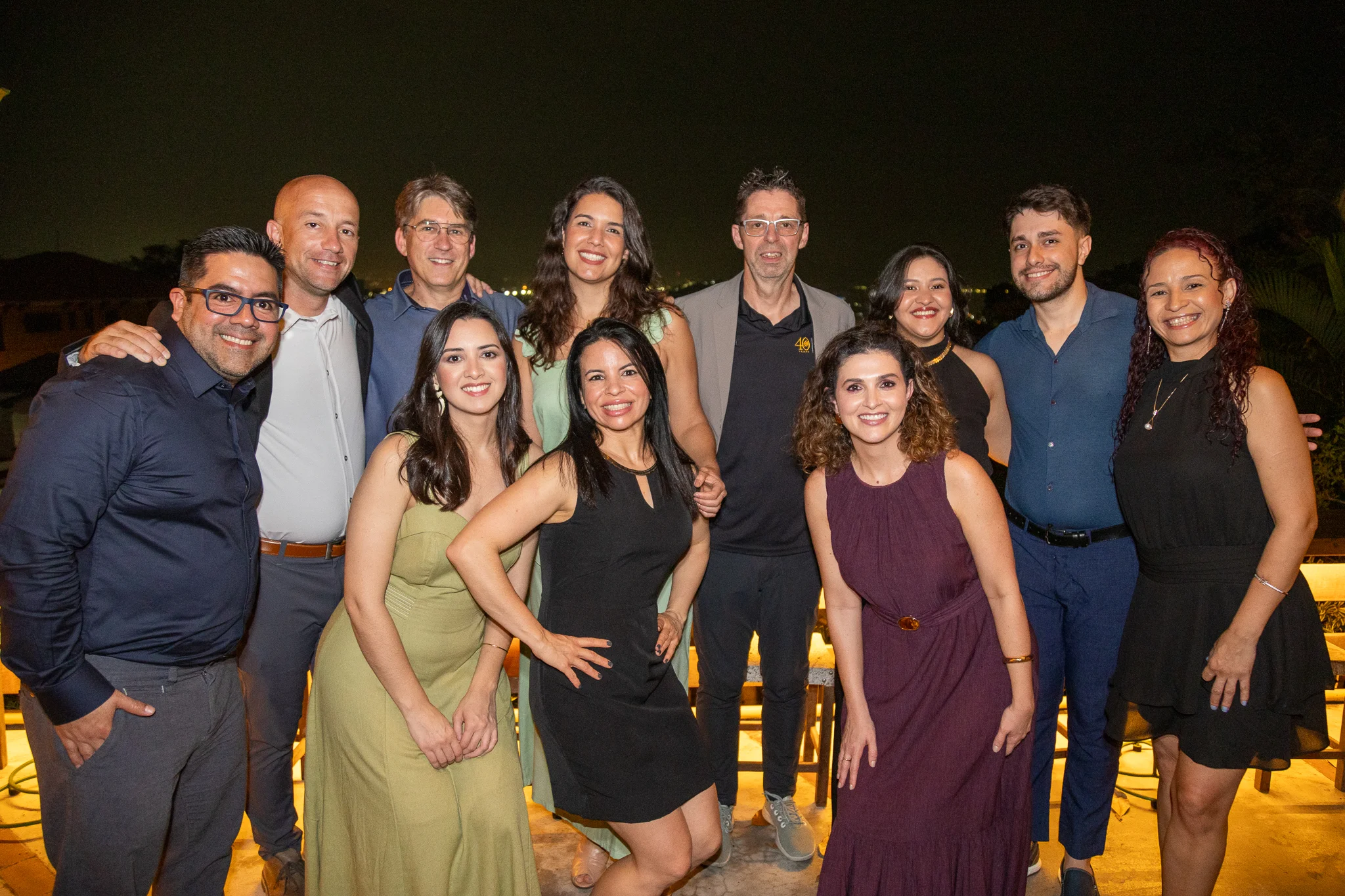Brazil team rooftop group photo at the 40th anniversary celebration
