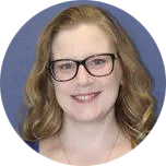 Dr. Crystal Walline smiles at the camera. She has blonde hair and wears glasses. She appears against a blue background.