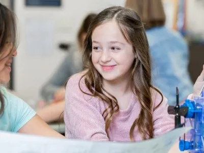 Girl in science lesson