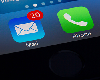 An image of a screen that has icons for Mail and Phone. The Mail icon has 20 notifications.
